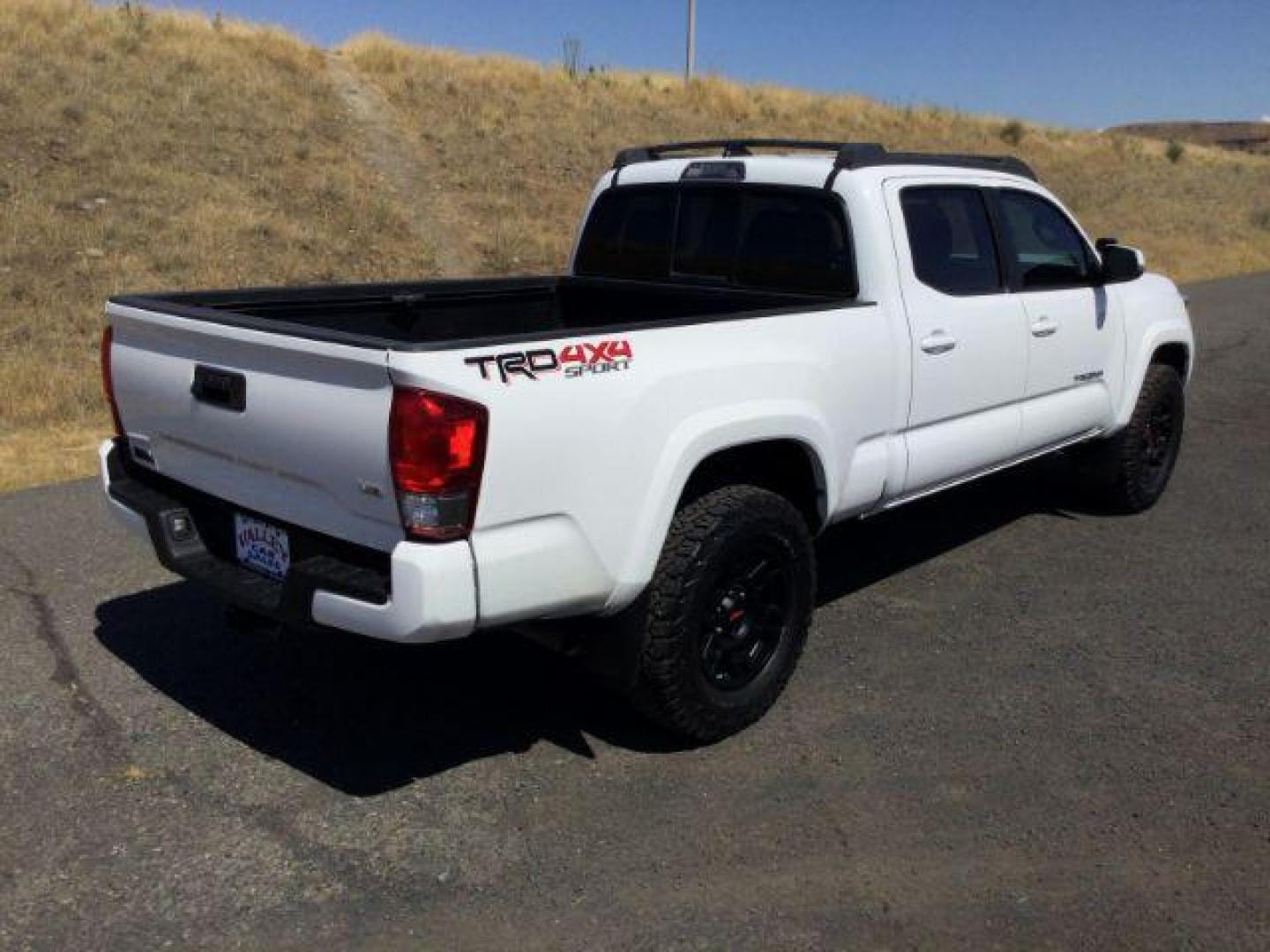 2016 Super White /Black Cloth Toyota Tacoma Crew Cab Long Bed TRD Sport 4WD (3TMDZ5BN0GM) with an 3.5L V-6 port/direct injection engine, 6-Speed Automatic transmission, located at 1801 Main Street, Lewiston, 83501, (208) 743-9371, 46.417065, -117.004799 - Photo#13