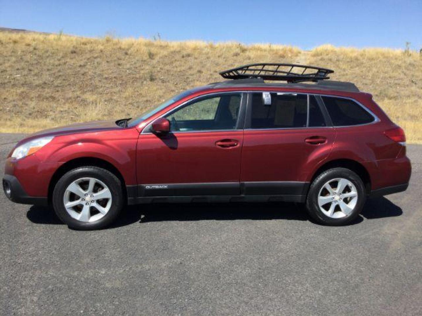 2014 Venetian Red Pearl /Black Subaru Outback 2.5i Premium (4S4BRBCC1E3) with an 2.5L H-4 DOHC engine, Automatic, CVT w/Manual Mode transmission, located at 1801 Main Street, Lewiston, 83501, (208) 743-9371, 46.417065, -117.004799 - Photo#1
