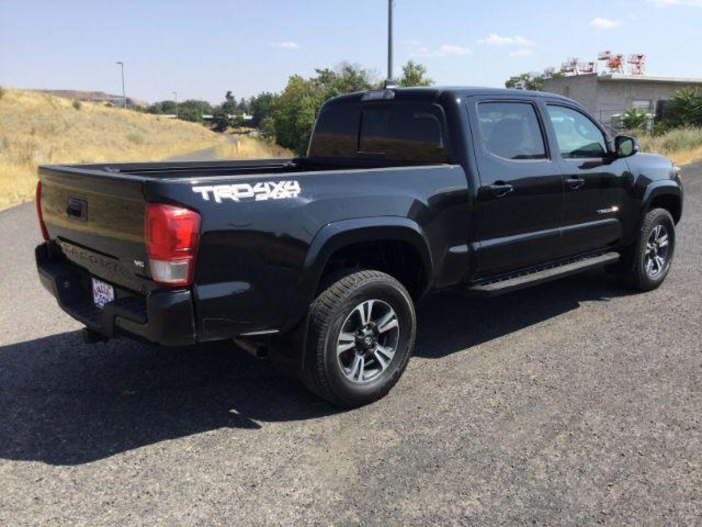 2017 Black /Graphite w/Gun Metal Toyota Tacoma Crew Cab TRD Sport Long Bed (5TFDZ5BN8HX) with an 3.5L V-6 port/direct injection engine, 6-Speed Automatic transmission, located at 1801 Main Street, Lewiston, 83501, (208) 743-9371, 46.417065, -117.004799 - Photo#2