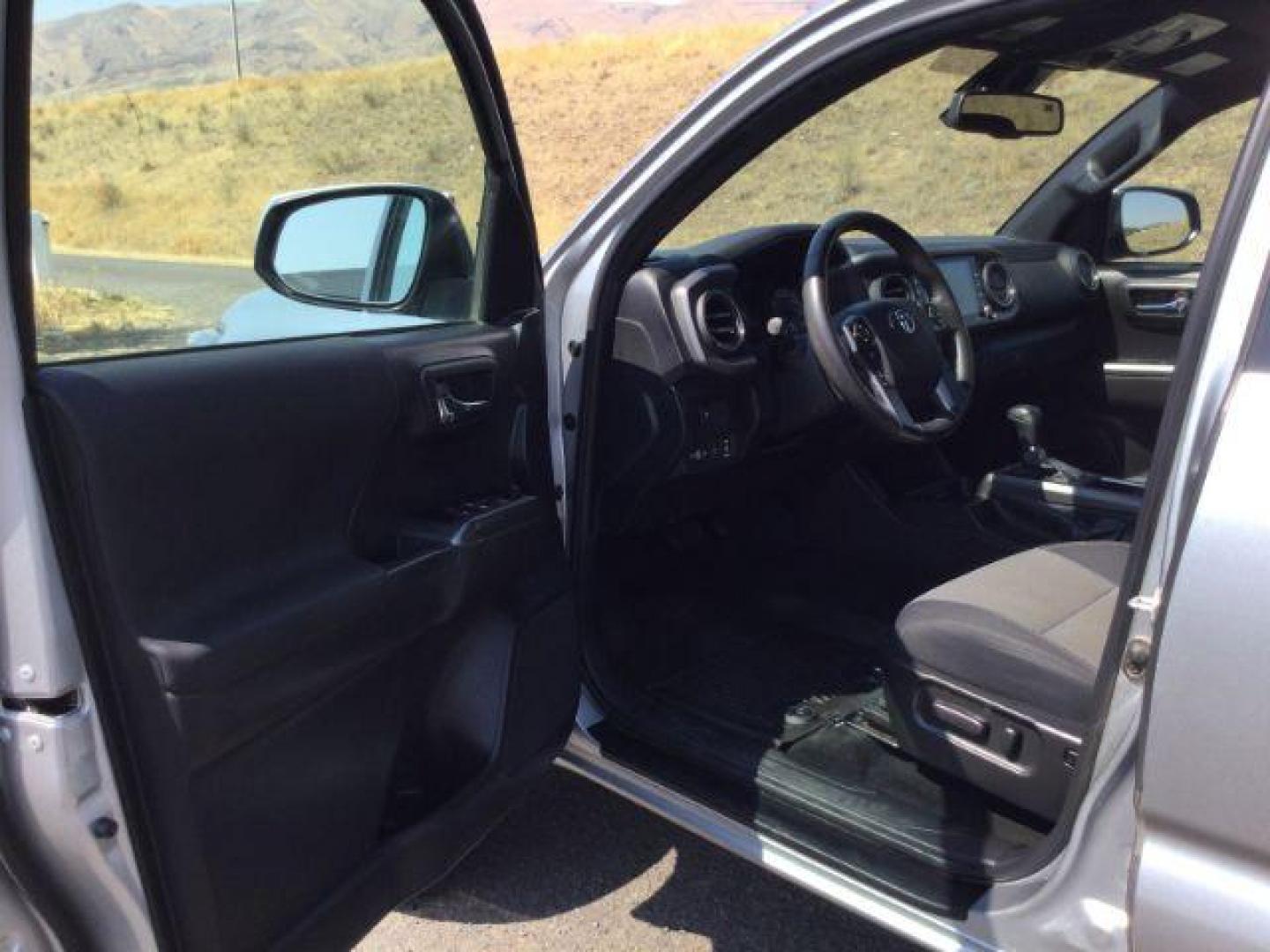2023 Celestial Silver Metallic /Black/Gun Metal Toyota Tacoma TRD Off Road (3TMDZ5BN2PM) with an 3.5L V-6 port/direct injection engine, 6-SPEED AUTOMATIC transmission, located at 1801 Main Street, Lewiston, 83501, (208) 743-9371, 46.417065, -117.004799 - Photo#3