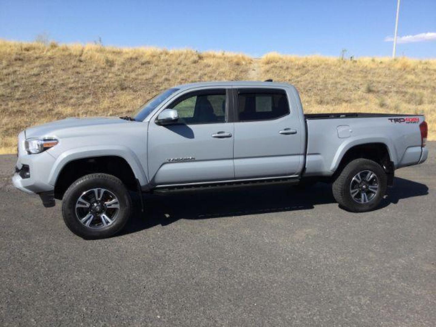 2019 Cement /Graphite w/Gun Metal Toyota Tacoma Crew Cab TRD Sport Long Bed (5TFDZ5BN1KX) with an 3.5L V-6 port/direct injection engine, 6-Speed Automatic transmission, located at 1801 Main Street, Lewiston, 83501, (208) 743-9371, 46.417065, -117.004799 - Photo#1