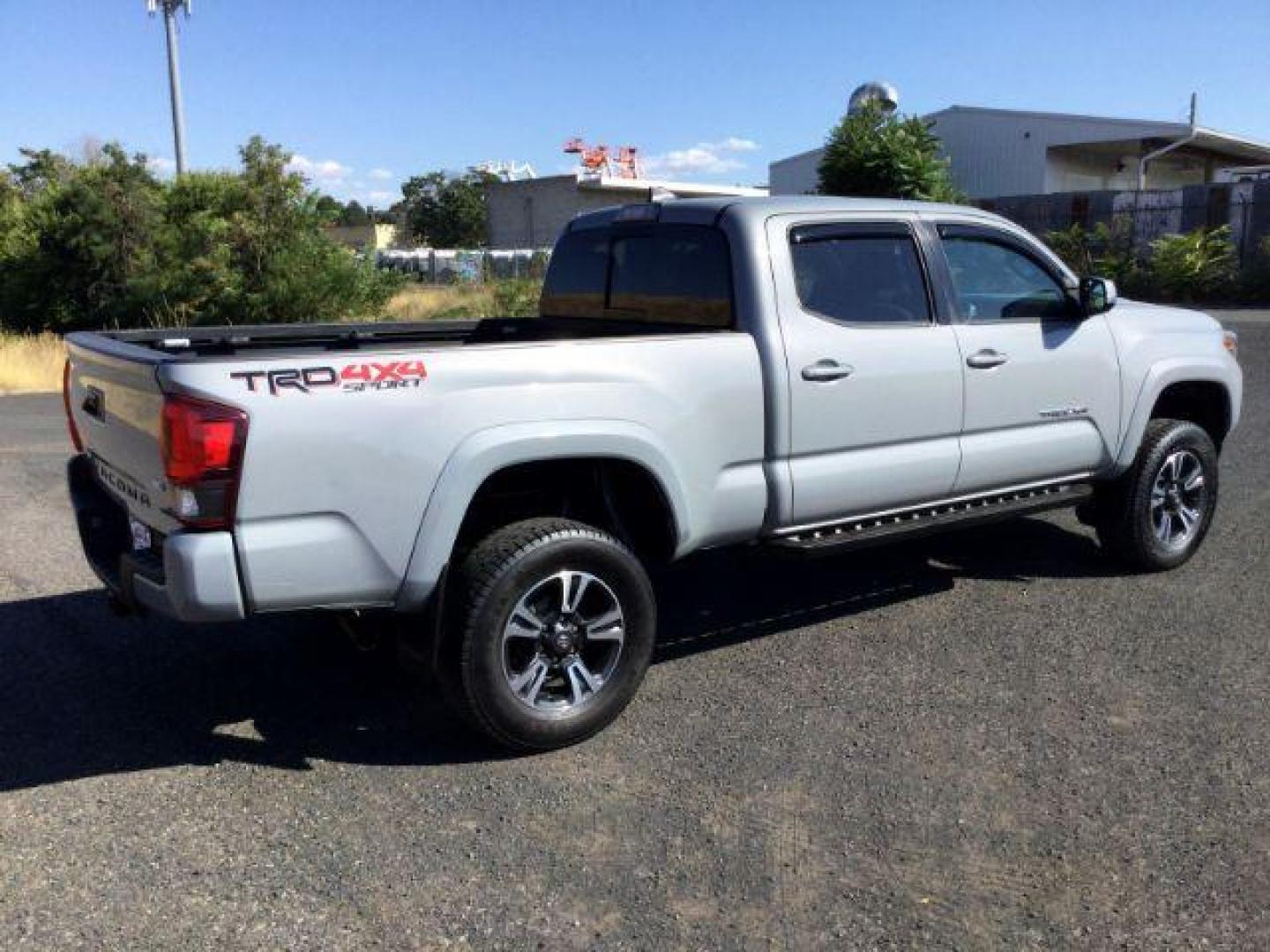 2019 Cement /Graphite w/Gun Metal Toyota Tacoma Crew Cab TRD Sport Long Bed (5TFDZ5BN1KX) with an 3.5L V-6 port/direct injection engine, 6-Speed Automatic transmission, located at 1801 Main Street, Lewiston, 83501, (208) 743-9371, 46.417065, -117.004799 - Photo#17