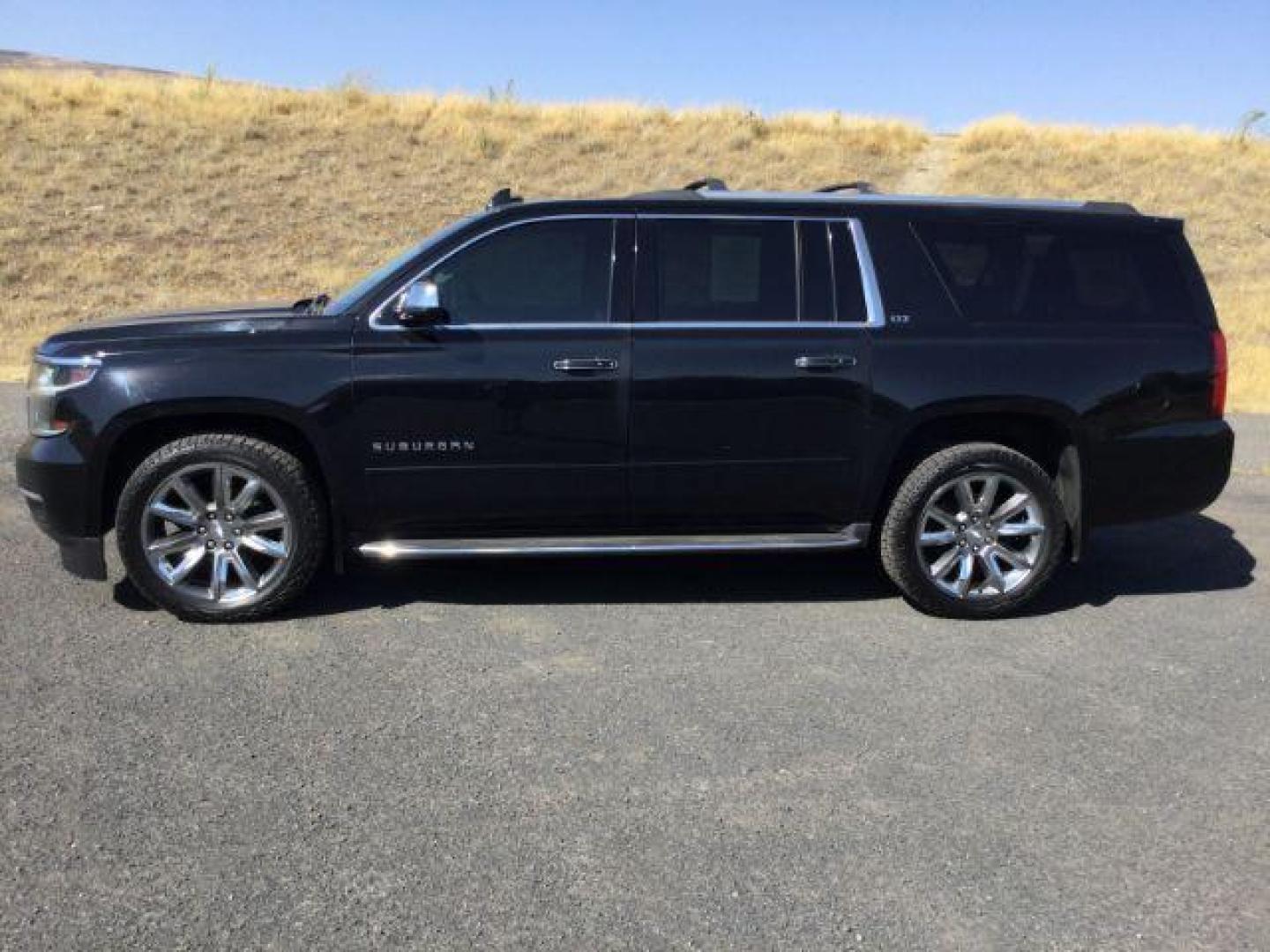 2016 Black /Jet Black Chevrolet Suburban LTZ (1GNSKJKC6GR) with an EcoTec3 5.3L V-8 gasoline direct injection engine, 6-Speed Automatic transmission, located at 1801 Main Street, Lewiston, 83501, (208) 743-9371, 46.417065, -117.004799 - Photo#2