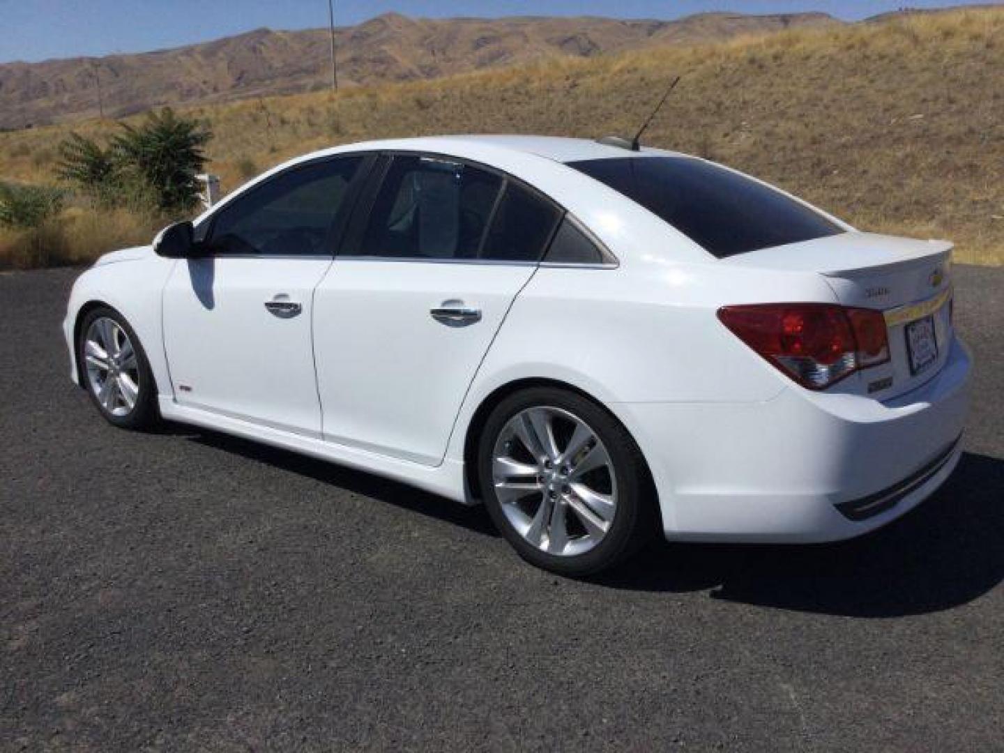 2015 Summit White /Jet Black Chevrolet Cruze LTZ (1G1PG5SB5F7) with an ECOTEC 1.4L I-4 DOHC engine, 6-Speed Automatic transmission, located at 1801 Main Street, Lewiston, 83501, (208) 743-9371, 46.417065, -117.004799 - Photo#2