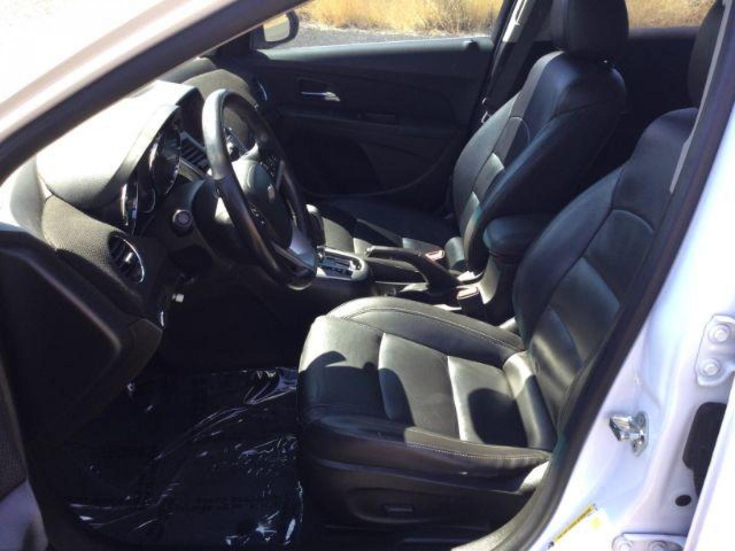 2015 Summit White /Jet Black Chevrolet Cruze LTZ (1G1PG5SB5F7) with an ECOTEC 1.4L I-4 DOHC engine, 6-Speed Automatic transmission, located at 1801 Main Street, Lewiston, 83501, (208) 743-9371, 46.417065, -117.004799 - Photo#4