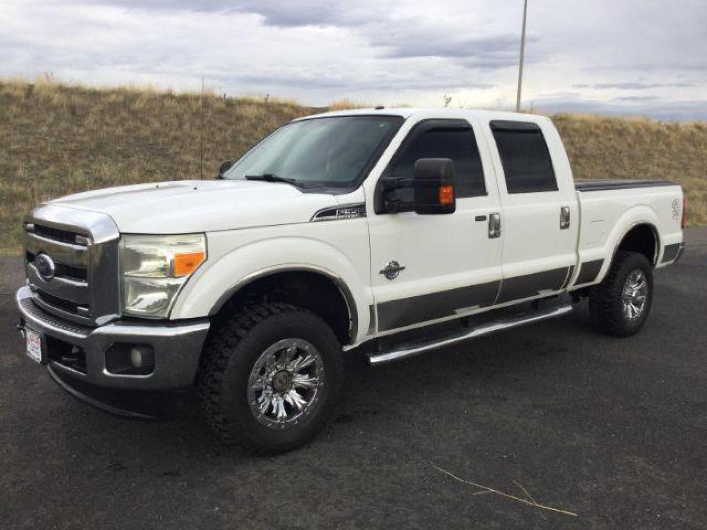 2011 Oxford White /Black Ford F-350 LARIAT (1FT8W3BTXBE) with an Powerstroke 6.7L V-8 diesel direct injection engine, 6-SPEED AUTOMATIC transmission, located at 1801 Main Street, Lewiston, 83501, (208) 743-9371, 46.417065, -117.004799 - Photo#1