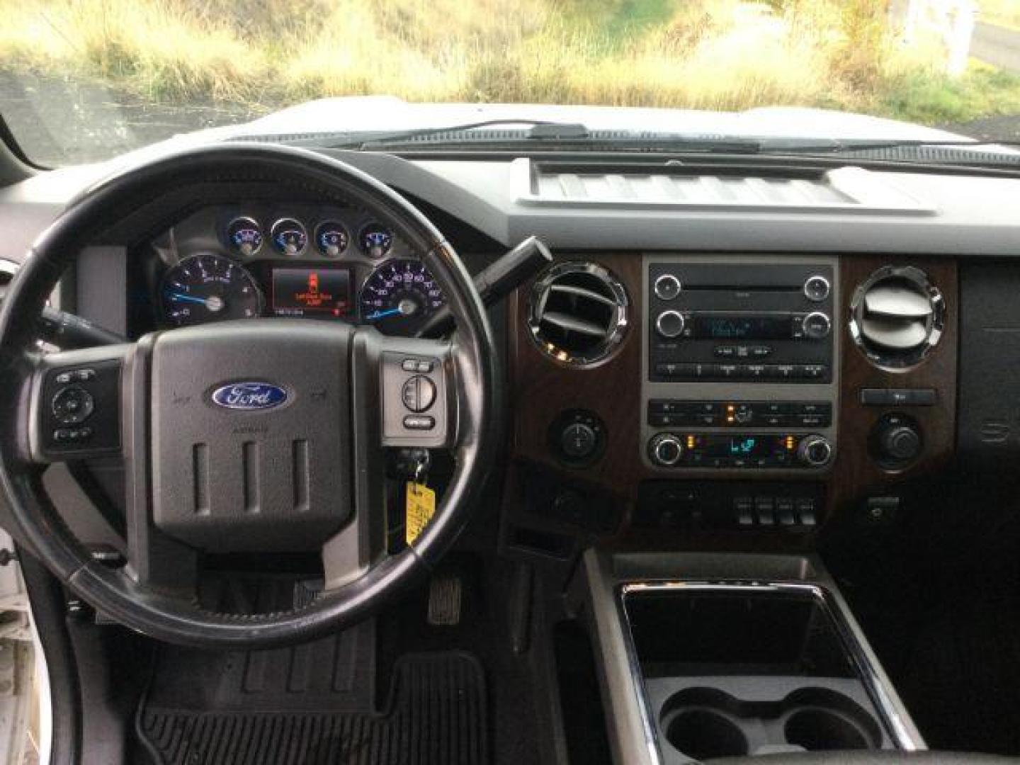 2011 Oxford White /Black Ford F-350 LARIAT (1FT8W3BTXBE) with an Powerstroke 6.7L V-8 diesel direct injection engine, 6-SPEED AUTOMATIC transmission, located at 1801 Main Street, Lewiston, 83501, (208) 743-9371, 46.417065, -117.004799 - Photo#7