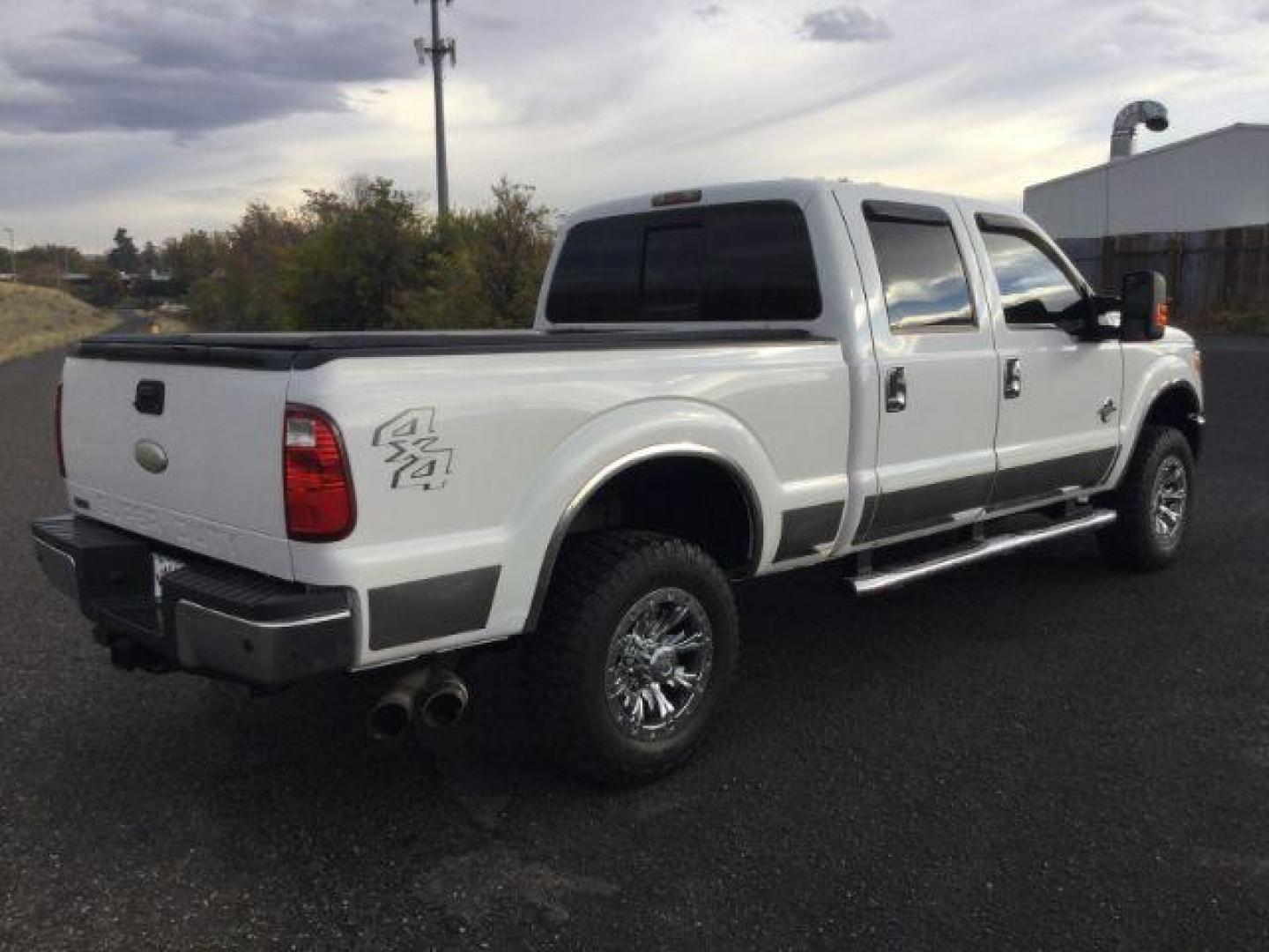 2011 Oxford White /Black Ford F-350 LARIAT (1FT8W3BTXBE) with an Powerstroke 6.7L V-8 diesel direct injection engine, 6-SPEED AUTOMATIC transmission, located at 1801 Main Street, Lewiston, 83501, (208) 743-9371, 46.417065, -117.004799 - Photo#9