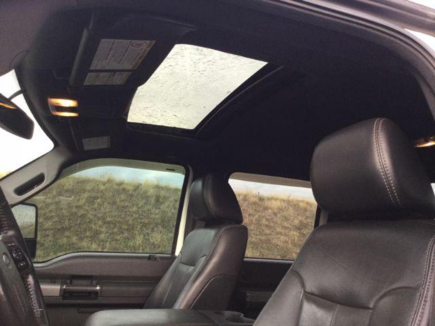 2011 Oxford White /Black Ford F-350 LARIAT (1FT8W3BTXBE) with an Powerstroke 6.7L V-8 diesel direct injection engine, 6-SPEED AUTOMATIC transmission, located at 1801 Main Street, Lewiston, 83501, (208) 743-9371, 46.417065, -117.004799 - Photo#10