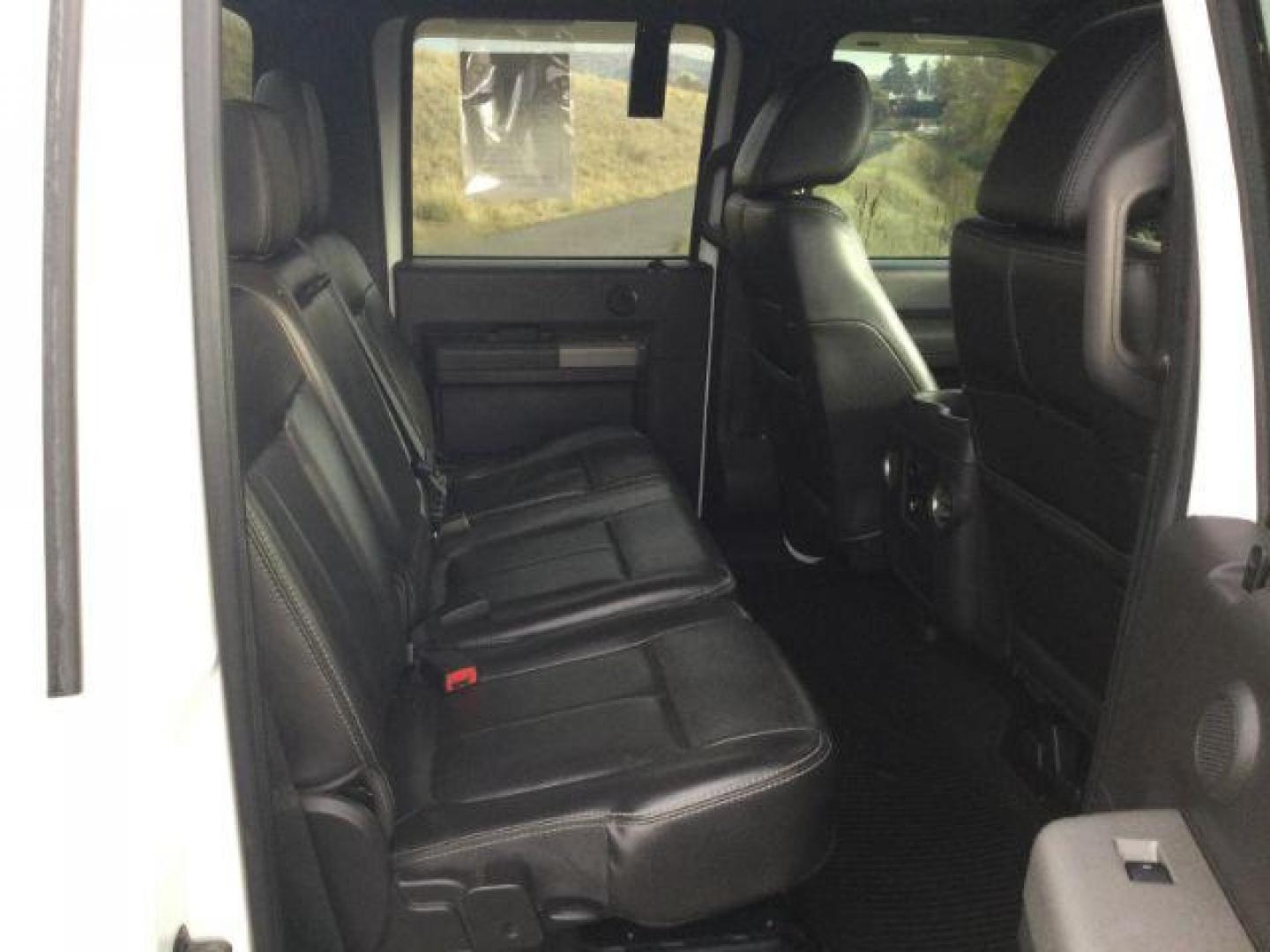 2011 Oxford White /Black Ford F-350 LARIAT (1FT8W3BTXBE) with an Powerstroke 6.7L V-8 diesel direct injection engine, 6-SPEED AUTOMATIC transmission, located at 1801 Main Street, Lewiston, 83501, (208) 743-9371, 46.417065, -117.004799 - Photo#18