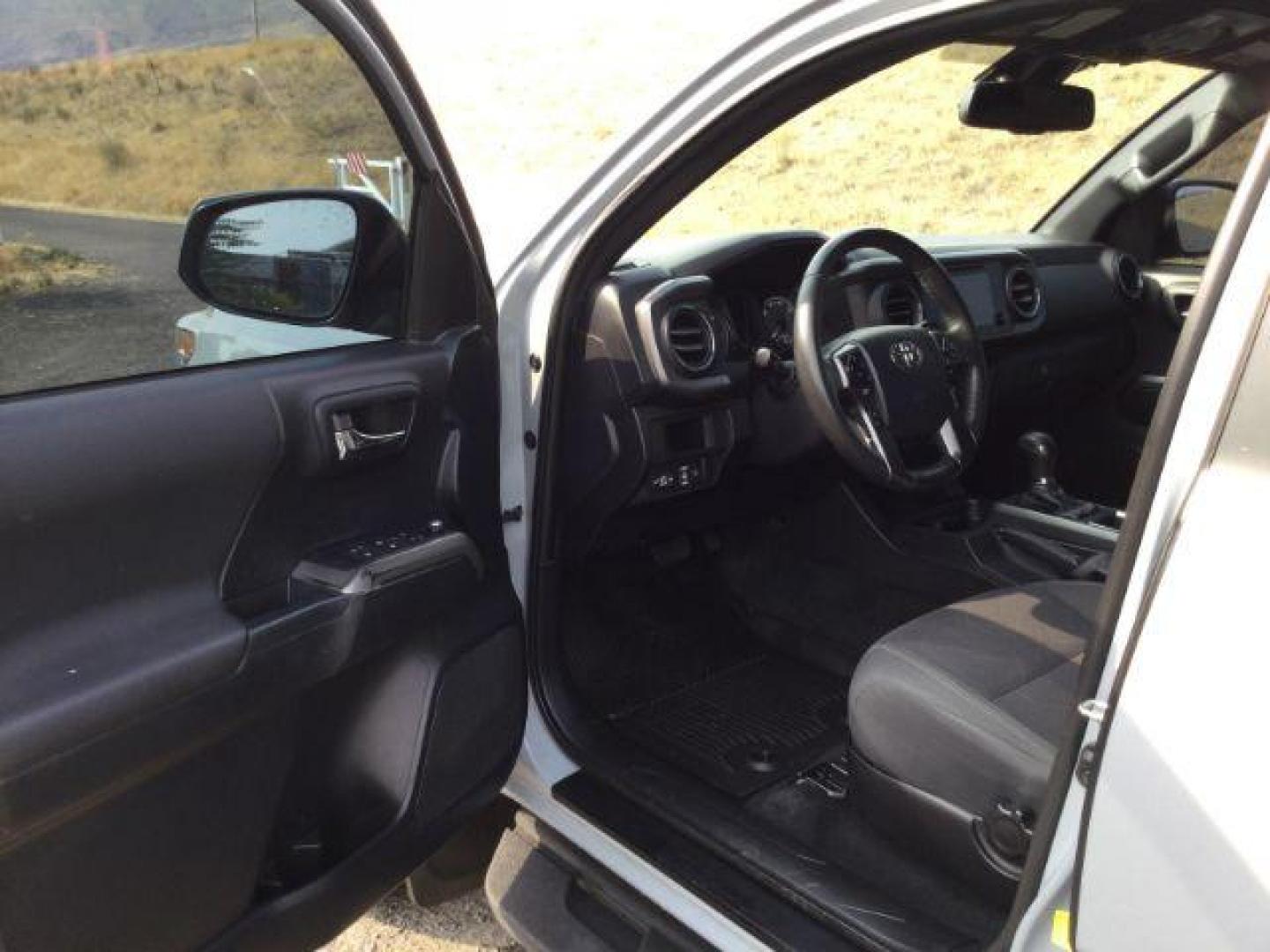 2018 Magnetic Gray Metallic /Black w/Gun Metal Toyota Tacoma Crew Cab TRD Off Road 4X4 (3TMCZ5AN4JM) with an 3.5L V-6 port/direct injection engine, 6-Speed Automatic transmission, located at 1801 Main Street, Lewiston, 83501, (208) 743-9371, 46.417065, -117.004799 - Photo#5