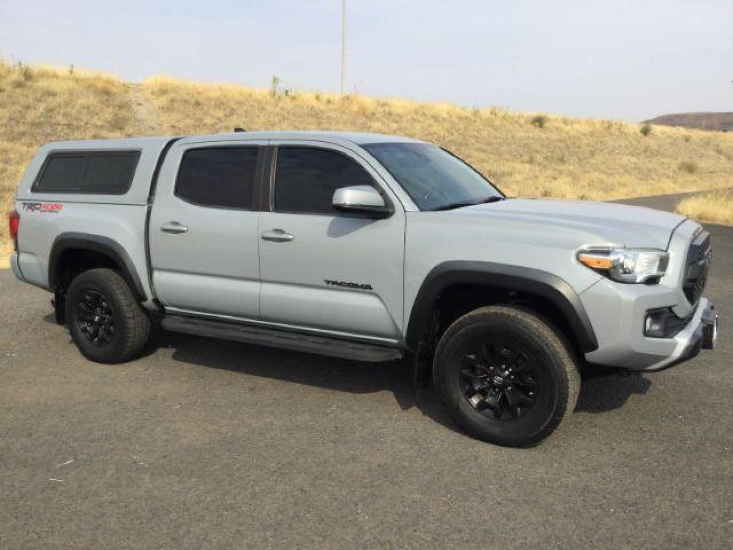 2018 Magnetic Gray Metallic /Black w/Gun Metal Toyota Tacoma Crew Cab TRD Off Road 4X4 (3TMCZ5AN4JM) with an 3.5L V-6 port/direct injection engine, 6-Speed Automatic transmission, located at 1801 Main Street, Lewiston, 83501, (208) 743-9371, 46.417065, -117.004799 - Photo#11
