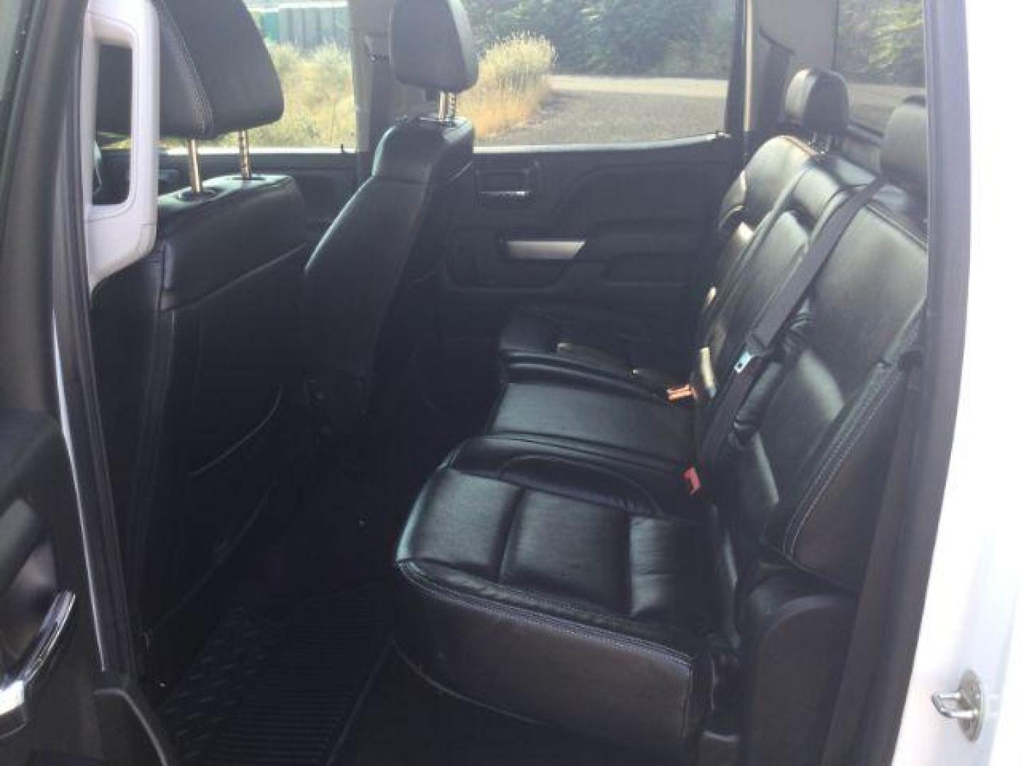 2017 Summit White Chevrolet Silverado 1500 1LT (3GCUKREC7HG) with an EcoTec3 4.3L V-6 gasoline direct injection engine, located at 1801 Main Street, Lewiston, 83501, (208) 743-9371, 46.417065, -117.004799 - Photo#5