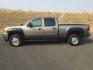 2012 Mocha Steel Metallic /Ebony GMC Sierra 2500HD SLE (1GT120C85CF) with an Duramax 6.6L V-8 diesel direct injection engine, 6-Speed Automatic transmission, located at 1801 Main Street, Lewiston, 83501, (208) 743-9371, 46.417065, -117.004799 - Photo#1