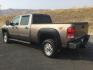 2012 Mocha Steel Metallic /Ebony GMC Sierra 2500HD SLE (1GT120C85CF) with an Duramax 6.6L V-8 diesel direct injection engine, 6-Speed Automatic transmission, located at 1801 Main Street, Lewiston, 83501, (208) 743-9371, 46.417065, -117.004799 - Photo#2