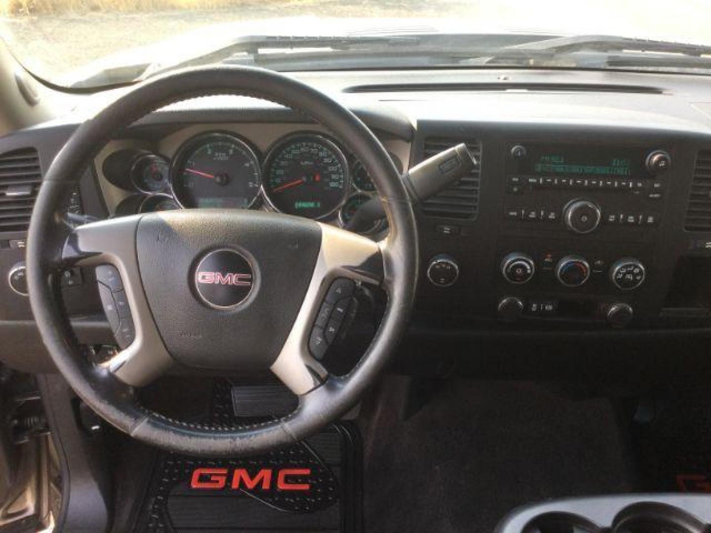 2012 Mocha Steel Metallic /Ebony GMC Sierra 2500HD SLE (1GT120C85CF) with an Duramax 6.6L V-8 diesel direct injection engine, 6-Speed Automatic transmission, located at 1801 Main Street, Lewiston, 83501, (208) 743-9371, 46.417065, -117.004799 - Photo#5