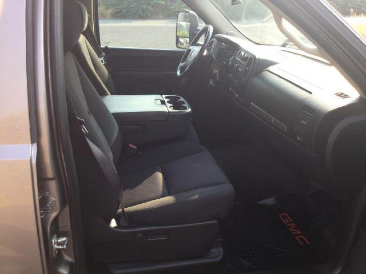 2012 Mocha Steel Metallic /Ebony GMC Sierra 2500HD SLE (1GT120C85CF) with an Duramax 6.6L V-8 diesel direct injection engine, 6-Speed Automatic transmission, located at 1801 Main Street, Lewiston, 83501, (208) 743-9371, 46.417065, -117.004799 - Photo#12