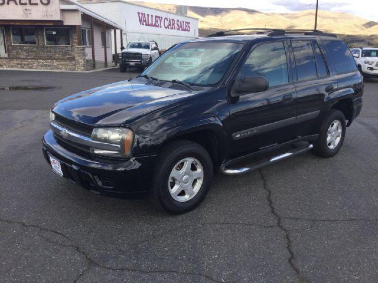 2003 Black /Medium Pewter Chevrolet TrailBlazer LS (1GNDT13S132) with an Vortec 4.2L I-6 DOHC engine, 4 speed Automatic transmission, located at 1801 Main Street, Lewiston, 83501, (208) 743-9371, 46.417065, -117.004799 - Photo#1