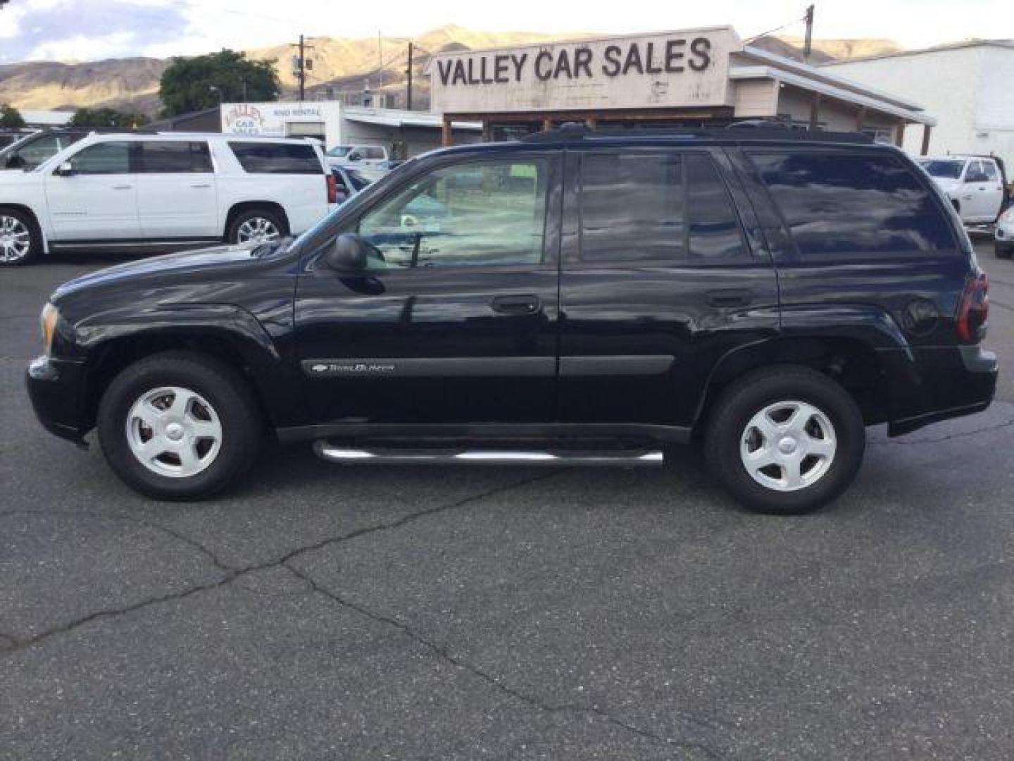 2003 Black /Medium Pewter Chevrolet TrailBlazer LS (1GNDT13S132) with an Vortec 4.2L I-6 DOHC engine, 4 speed Automatic transmission, located at 1801 Main Street, Lewiston, 83501, (208) 743-9371, 46.417065, -117.004799 - Photo#2