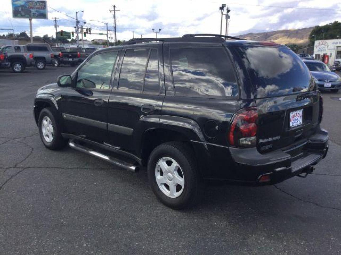 2003 Black /Medium Pewter Chevrolet TrailBlazer LS (1GNDT13S132) with an Vortec 4.2L I-6 DOHC engine, 4 speed Automatic transmission, located at 1801 Main Street, Lewiston, 83501, (208) 743-9371, 46.417065, -117.004799 - Photo#3