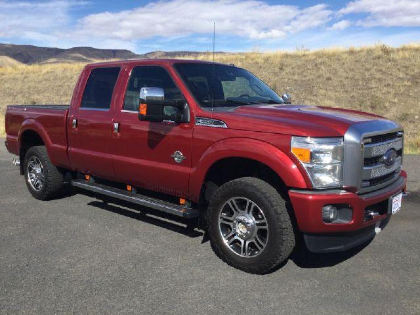 2015 Ruby Red Metallic Tinted Clearcoat /BLACK LEATHER Ford F-350 Lariat Crew Cab 4WD (1FT8W3BT5FE) with an Powerstroke 6.7L V-8 diesel direct injection engine, 6-Speed Automatic transmission, located at 1801 Main Street, Lewiston, 83501, (208) 743-9371, 46.417065, -117.004799 - Photo#2