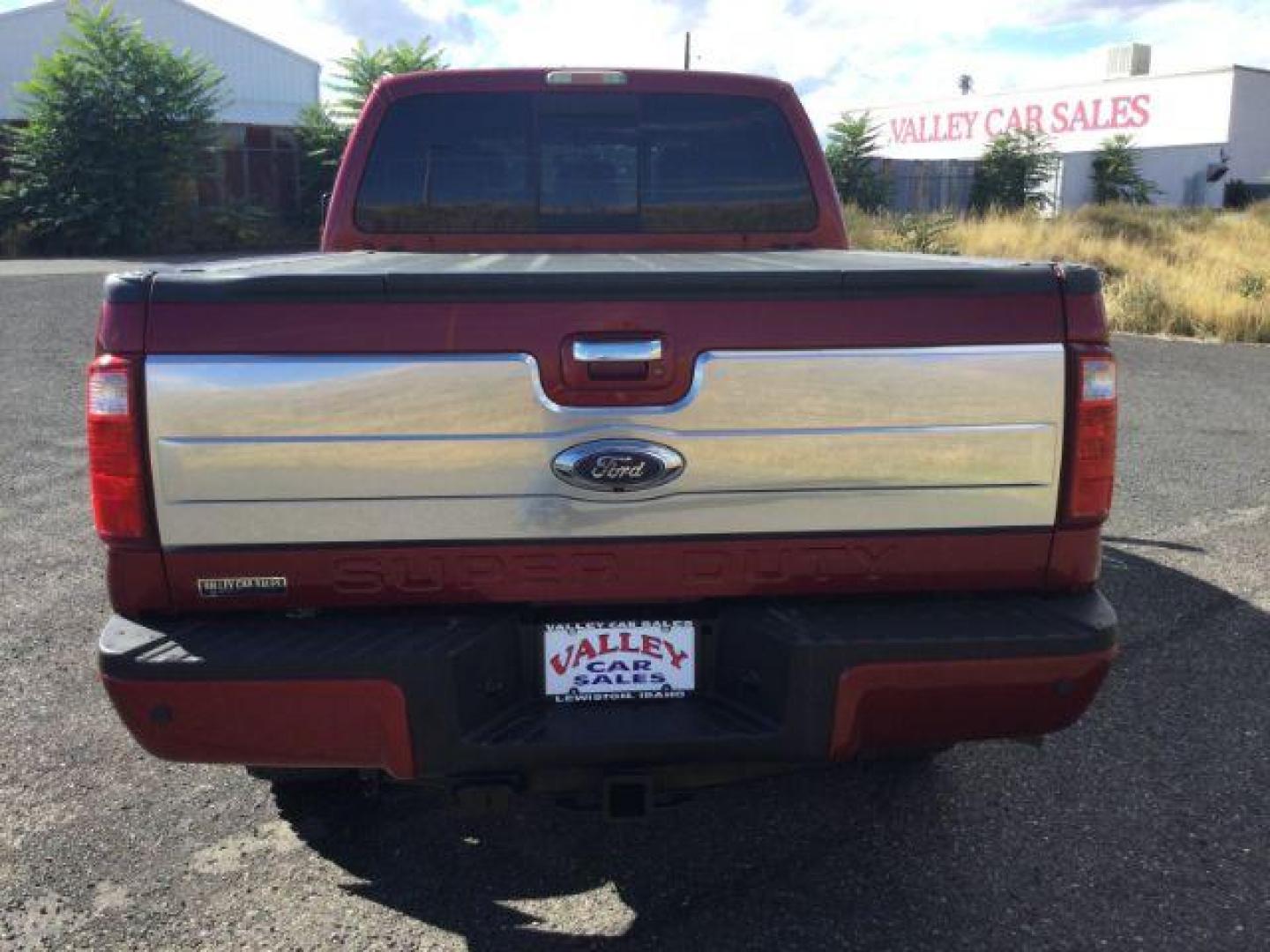 2015 Ruby Red Metallic Tinted Clearcoat /BLACK LEATHER Ford F-350 Lariat Crew Cab 4WD (1FT8W3BT5FE) with an Powerstroke 6.7L V-8 diesel direct injection engine, 6-Speed Automatic transmission, located at 1801 Main Street, Lewiston, 83501, (208) 743-9371, 46.417065, -117.004799 - Photo#14