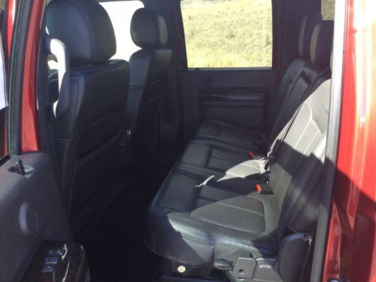 2015 Ruby Red Metallic Tinted Clearcoat /BLACK LEATHER Ford F-350 Lariat Crew Cab 4WD (1FT8W3BT5FE) with an Powerstroke 6.7L V-8 diesel direct injection engine, 6-Speed Automatic transmission, located at 1801 Main Street, Lewiston, 83501, (208) 743-9371, 46.417065, -117.004799 - Photo#16