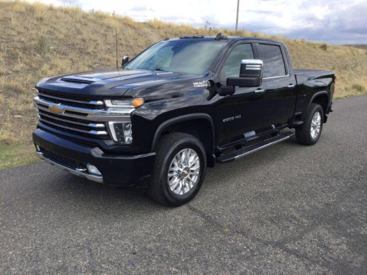 2021 Mosaic Black Metallic Chevrolet Silverado 2500HD 4WD Crew Cab Standard Bed High Country | 4WD Crew Cab Long Bed High Country (1GC1YREY0MF) , located at 1801 Main Street, Lewiston, 83501, (208) 743-9371, 46.417065, -117.004799 - Photo#1