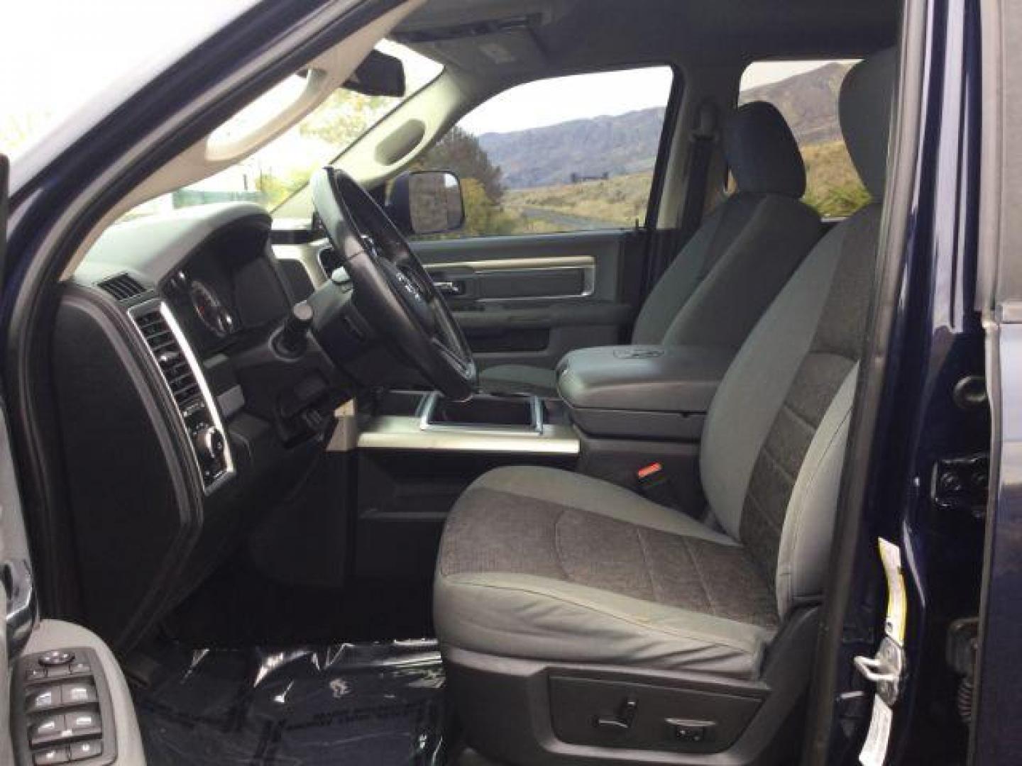 2014 True Blue Pearlcoat /Diesel Gray/Black Ram 2500 Crew Cab 4x4 SLT (3C6UR5DJ7EG) with an HEMI 6.4L V-8 VVT variable valve control engine, 6-Speed Automatic transmission, located at 1801 Main Street, Lewiston, 83501, (208) 743-9371, 46.417065, -117.004799 - Photo#5