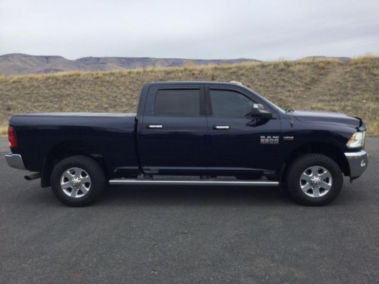 2014 True Blue Pearlcoat /Diesel Gray/Black Ram 2500 Crew Cab 4x4 SLT (3C6UR5DJ7EG) with an HEMI 6.4L V-8 VVT variable valve control engine, 6-Speed Automatic transmission, located at 1801 Main Street, Lewiston, 83501, (208) 743-9371, 46.417065, -117.004799- Photo#3