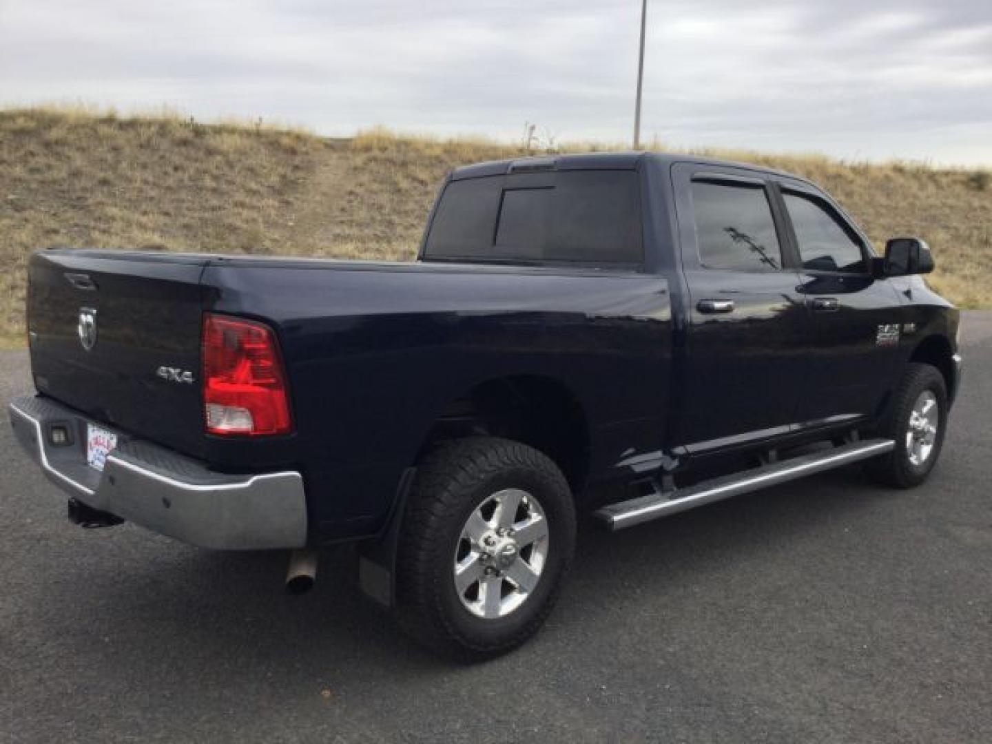 2014 True Blue Pearlcoat /Diesel Gray/Black Ram 2500 Crew Cab 4x4 SLT (3C6UR5DJ7EG) with an HEMI 6.4L V-8 VVT variable valve control engine, 6-Speed Automatic transmission, located at 1801 Main Street, Lewiston, 83501, (208) 743-9371, 46.417065, -117.004799- Photo#4