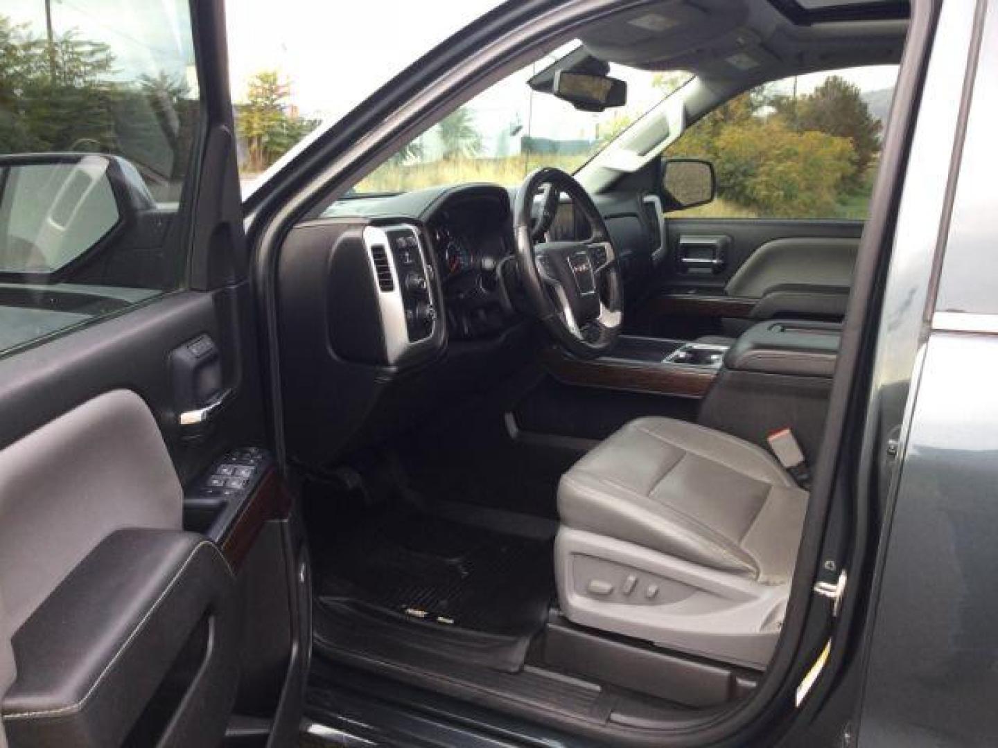 2018 Dark Slate Metallic /Jet Black GMC Sierra 1500 SLT (3GTU2NEC0JG) with an 5.3L V8 engine, 8-Speed Automatic transmission, located at 1801 Main Street, Lewiston, 83501, (208) 743-9371, 46.417065, -117.004799 - Photo#4