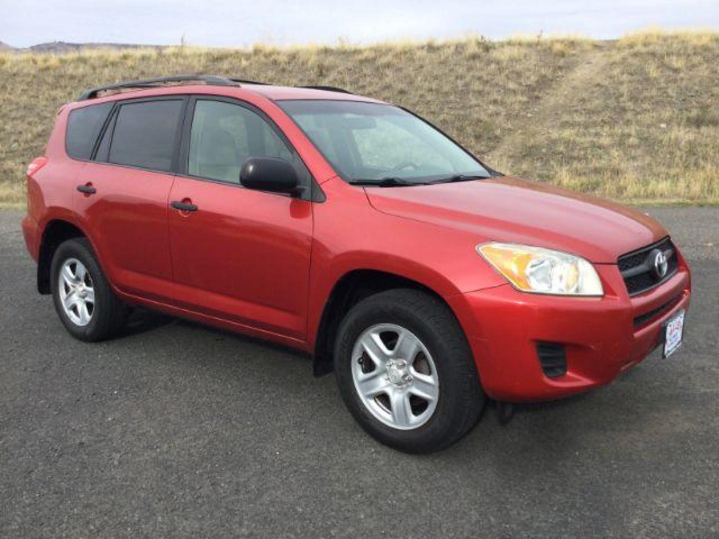 2009 RED /Beige Cloth Toyota RAV4 4WD (JTMBF33V59D) with an 2.5 4cyl engine, 4 speed Automatic transmission, located at 1801 Main Street, Lewiston, 83501, (208) 743-9371, 46.417065, -117.004799 - Photo#0