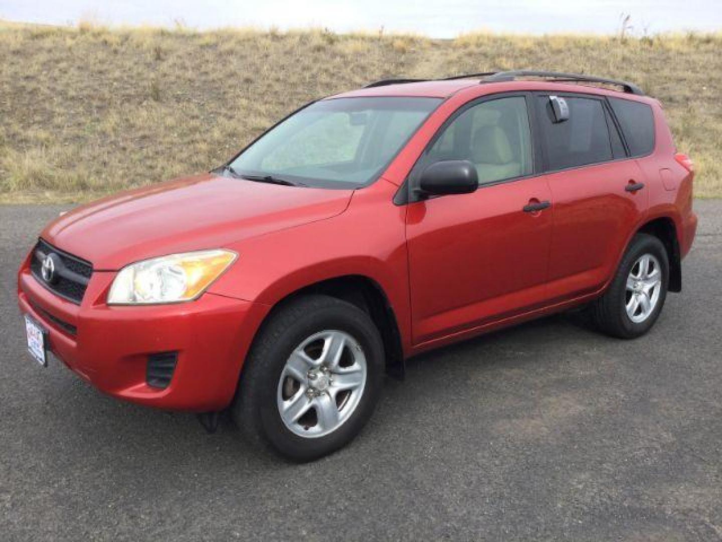 2009 RED /Beige Cloth Toyota RAV4 4WD (JTMBF33V59D) with an 2.5 4cyl engine, 4 speed Automatic transmission, located at 1801 Main Street, Lewiston, 83501, (208) 743-9371, 46.417065, -117.004799 - Photo#1