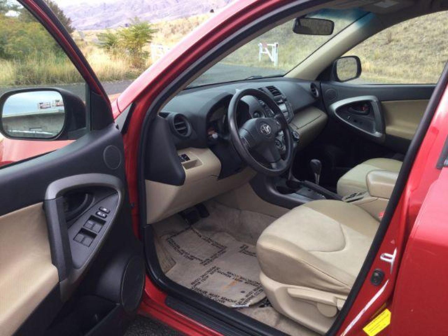 2009 RED /Beige Cloth Toyota RAV4 4WD (JTMBF33V59D) with an 2.5 4cyl engine, 4 speed Automatic transmission, located at 1801 Main Street, Lewiston, 83501, (208) 743-9371, 46.417065, -117.004799 - Photo#5