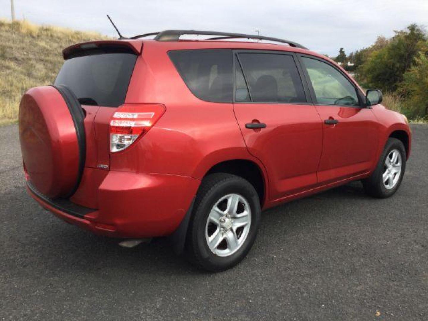 2009 RED /Beige Cloth Toyota RAV4 4WD (JTMBF33V59D) with an 2.5 4cyl engine, 4 speed Automatic transmission, located at 1801 Main Street, Lewiston, 83501, (208) 743-9371, 46.417065, -117.004799 - Photo#7