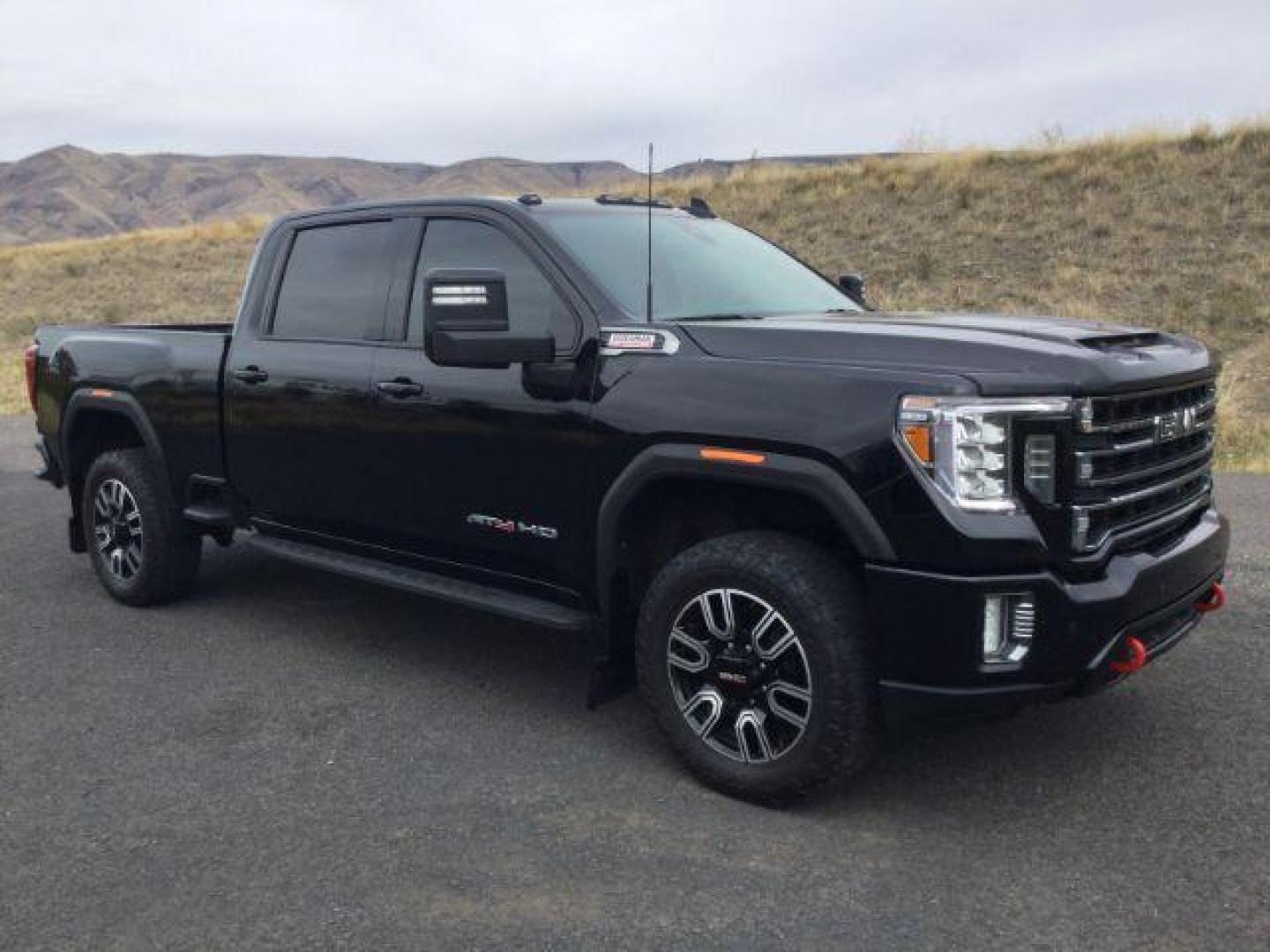 2021 Onyx Black /Jet Black w/Kalahari Accents GMC Sierra 2500HD 4WD Crew Cab Standard Bed AT4 (1GT49PEY7MF) with an Duramax 6.6L V-8 diesel direct injection engine, 10-speed automatic transmission, located at 1801 Main Street, Lewiston, 83501, (208) 743-9371, 46.417065, -117.004799 - Photo#1