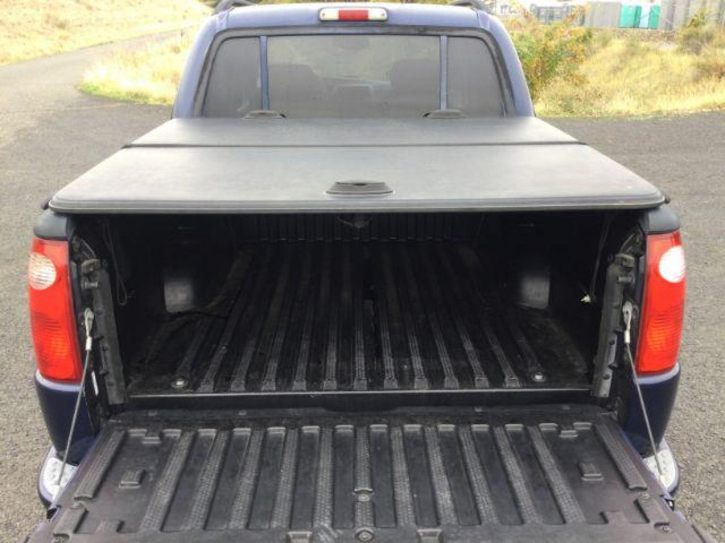 2004 Dark Blue Pearl Clearcoat Metallic /Medium Dark Flint/Dark Flint Ford Explorer Sport Trac XLT (1FMZU77K74U) with an 4.0L V6 DOHC 24V engine, 4 speed Automatic transmission, located at 1801 Main Street, Lewiston, 83501, (208) 743-9371, 46.417065, -117.004799 - Photo#8