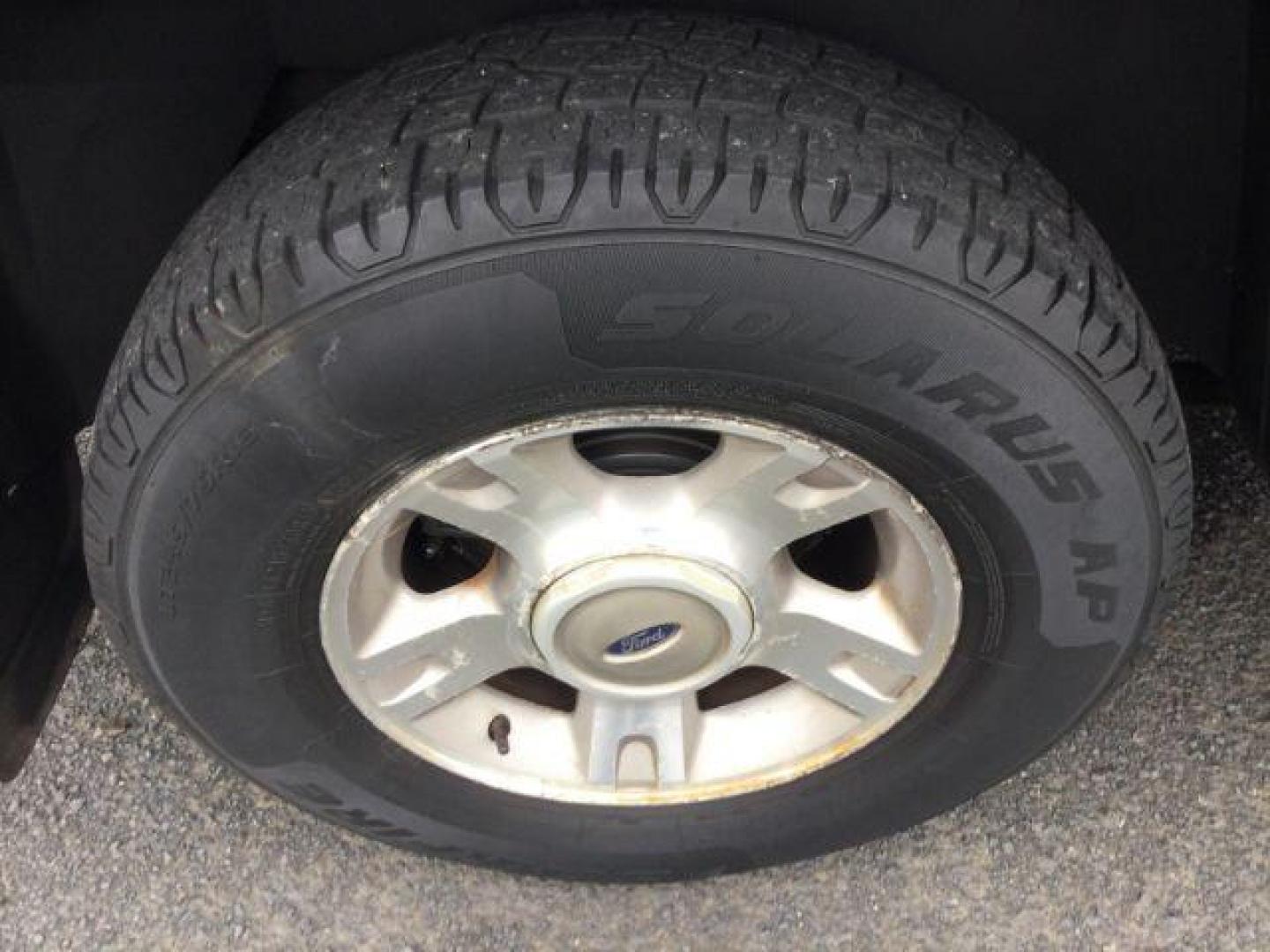 2004 Dark Blue Pearl Clearcoat Metallic /Medium Dark Flint/Dark Flint Ford Explorer Sport Trac XLT (1FMZU77K74U) with an 4.0L V6 DOHC 24V engine, 4 speed Automatic transmission, located at 1801 Main Street, Lewiston, 83501, (208) 743-9371, 46.417065, -117.004799 - Photo#10