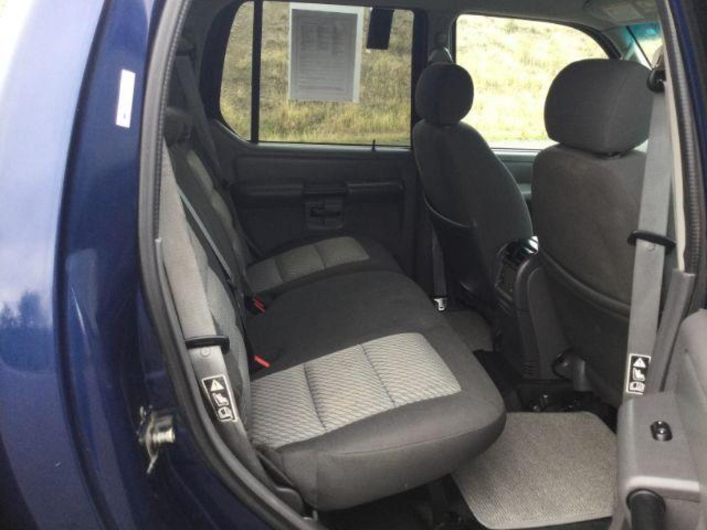 2004 Dark Blue Pearl Clearcoat Metallic /Medium Dark Flint/Dark Flint Ford Explorer Sport Trac XLT (1FMZU77K74U) with an 4.0L V6 DOHC 24V engine, 4 speed Automatic transmission, located at 1801 Main Street, Lewiston, 83501, (208) 743-9371, 46.417065, -117.004799 - Photo#11