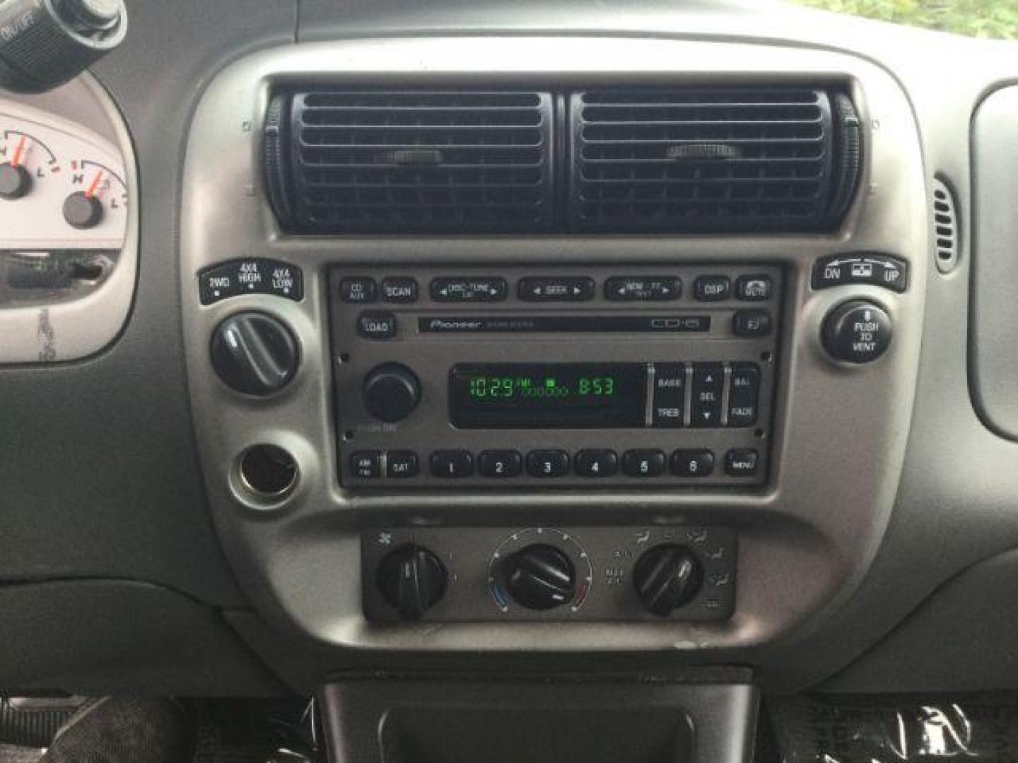 2004 Dark Blue Pearl Clearcoat Metallic /Medium Dark Flint/Dark Flint Ford Explorer Sport Trac XLT (1FMZU77K74U) with an 4.0L V6 DOHC 24V engine, 4 speed Automatic transmission, located at 1801 Main Street, Lewiston, 83501, (208) 743-9371, 46.417065, -117.004799 - Photo#14