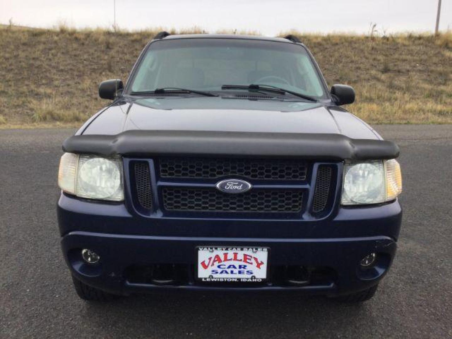 2004 Dark Blue Pearl Clearcoat Metallic /Medium Dark Flint/Dark Flint Ford Explorer Sport Trac XLT (1FMZU77K74U) with an 4.0L V6 DOHC 24V engine, 4 speed Automatic transmission, located at 1801 Main Street, Lewiston, 83501, (208) 743-9371, 46.417065, -117.004799 - Photo#16