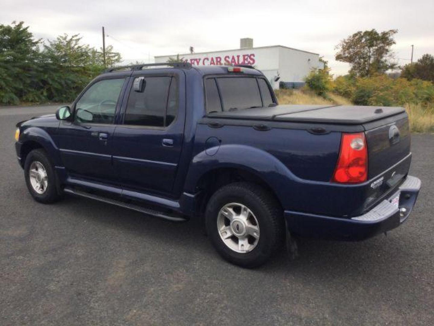 2004 Dark Blue Pearl Clearcoat Metallic /Medium Dark Flint/Dark Flint Ford Explorer Sport Trac XLT (1FMZU77K74U) with an 4.0L V6 DOHC 24V engine, 4 speed Automatic transmission, located at 1801 Main Street, Lewiston, 83501, (208) 743-9371, 46.417065, -117.004799 - Photo#17