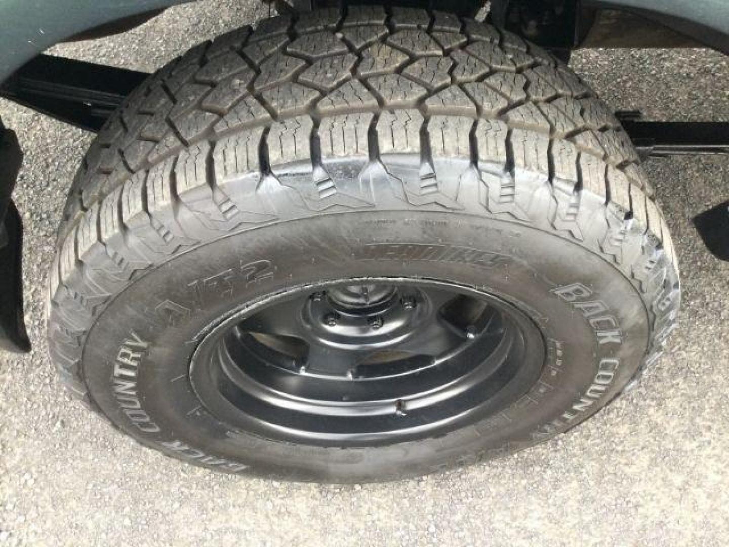 2003 Imperial Jade Mica /Oak Leather Toyota Tundra Limited V8 (5TBBT48163S) with an I-FORCE 4.7L V-8 DOHC engine, 4 speed automatic transmission, located at 1801 Main Street, Lewiston, 83501, (208) 743-9371, 46.417065, -117.004799 - Photo#9