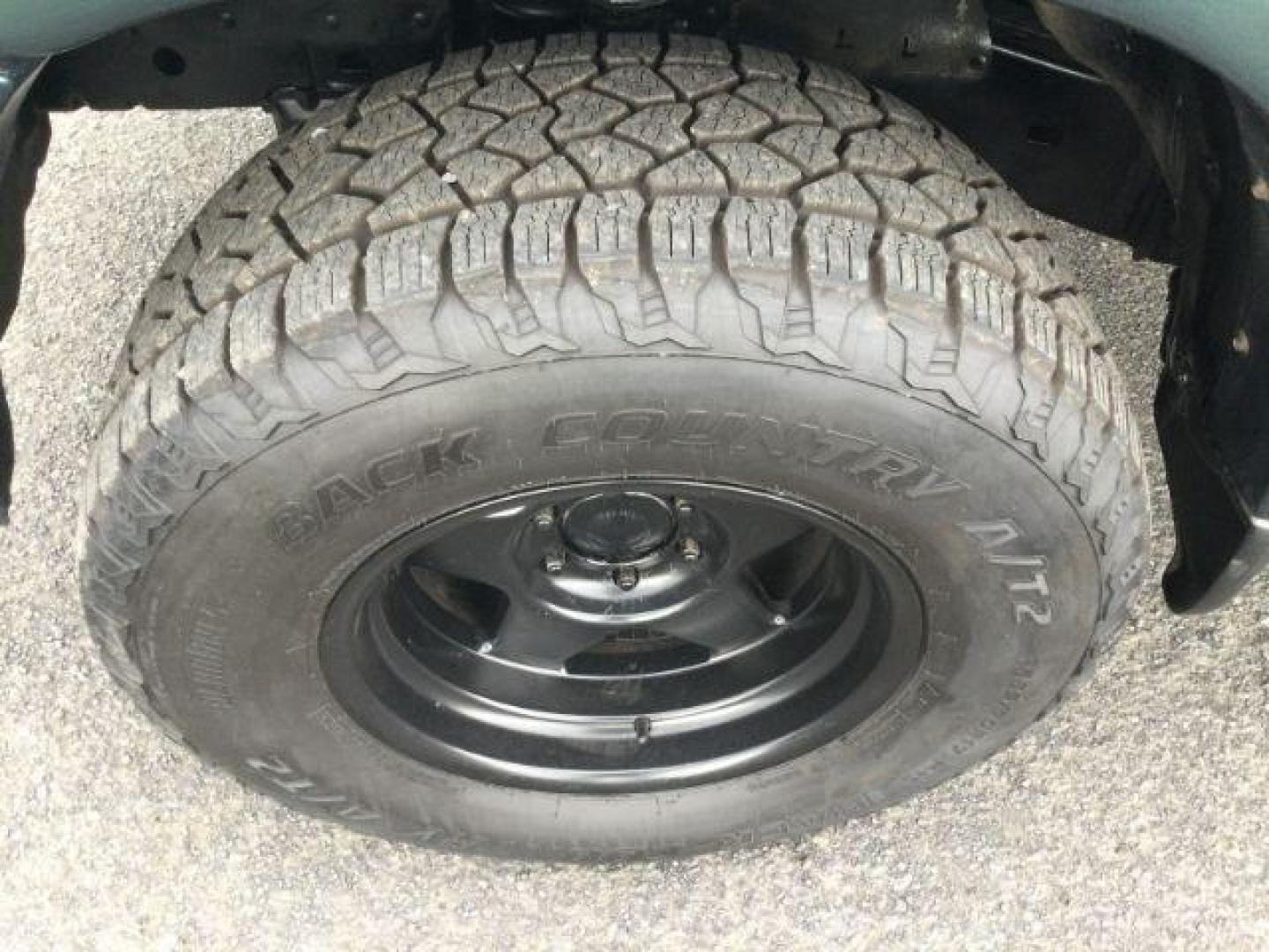 2003 Imperial Jade Mica /Oak Leather Toyota Tundra Limited V8 (5TBBT48163S) with an I-FORCE 4.7L V-8 DOHC engine, 4 speed automatic transmission, located at 1801 Main Street, Lewiston, 83501, (208) 743-9371, 46.417065, -117.004799 - Photo#16