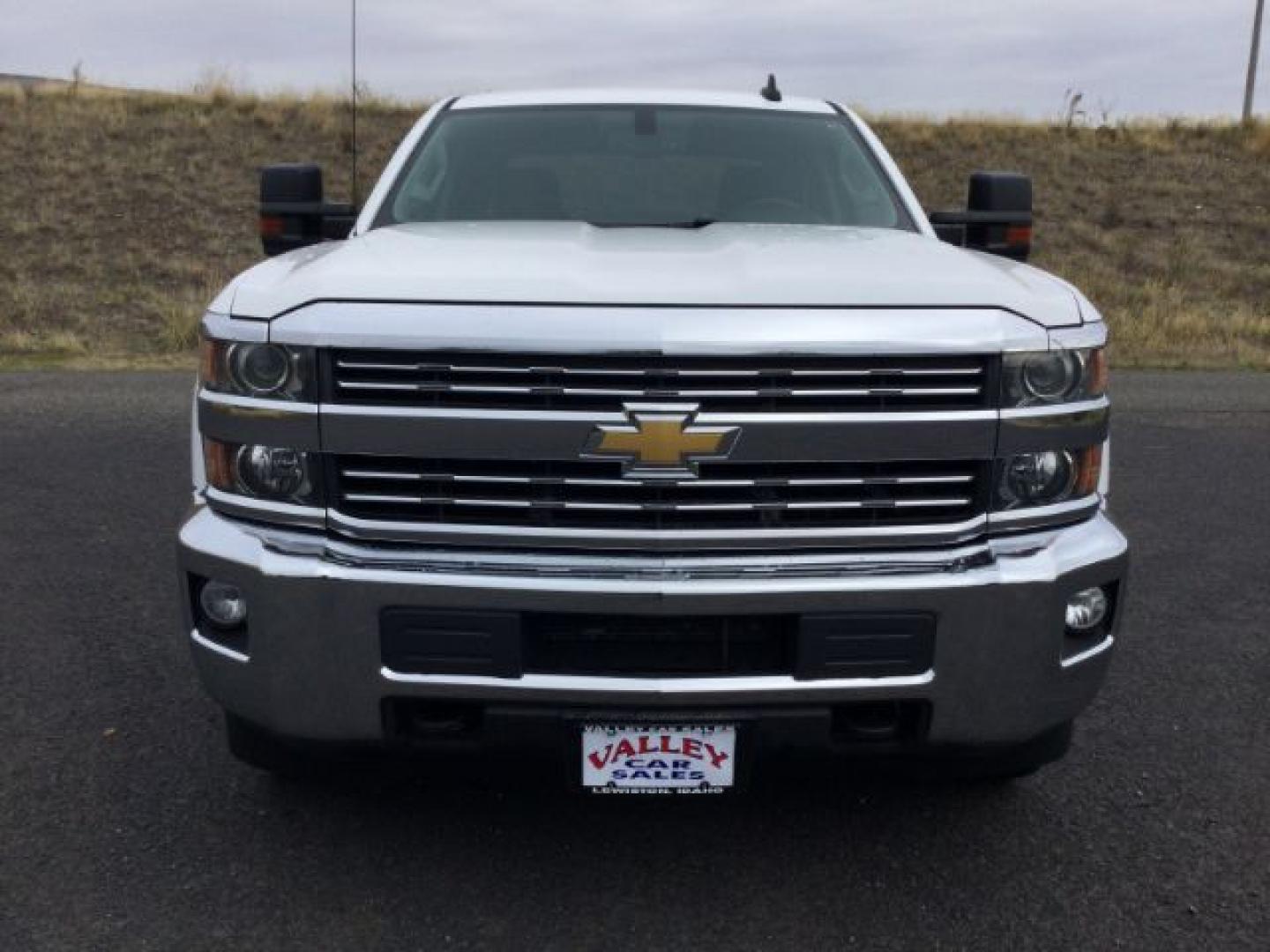 2015 Summit White /Dark Ash/Jet Black Chevrolet 2500 Crew Cab 4x4 LT (1GC1KVEG0FF) with an Vortec 6L V-8 variable valve control engine, 6-Speed Automatic transmission, located at 1801 Main Street, Lewiston, 83501, (208) 743-9371, 46.417065, -117.004799- Photo#19