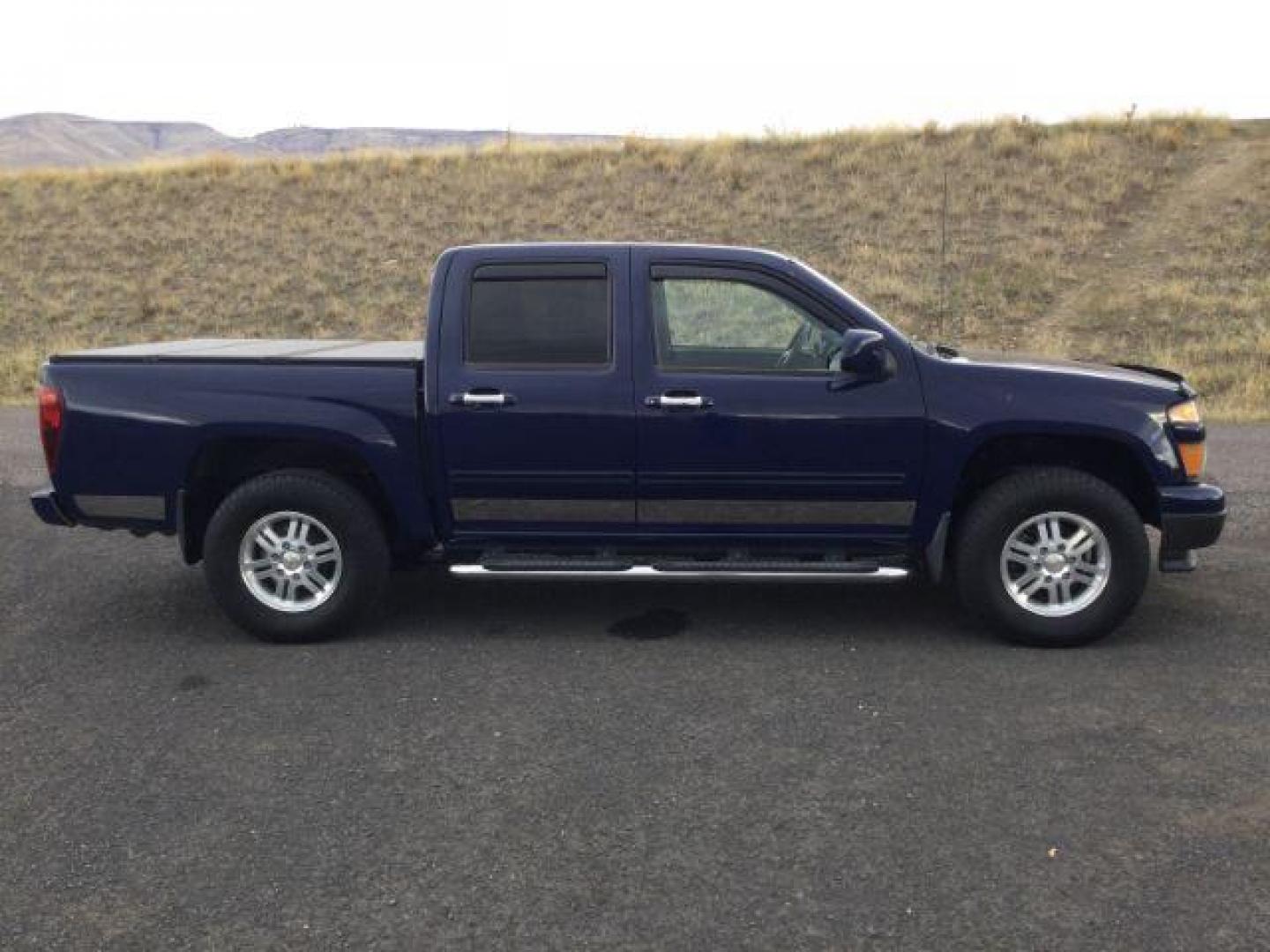 2012 Deep Navy /Ebony Chevrolet Colorado 1LT (1GCHTCFE0C8) with an 3.7L I-5 DOHC engine, Automatic, 4-Spd w/Overdrive transmission, located at 1801 Main Street, Lewiston, 83501, (208) 743-9371, 46.417065, -117.004799 - Photo#2