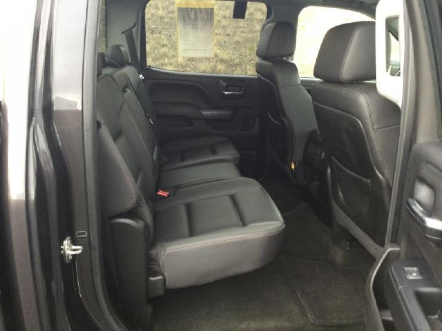 2015 Iridium Metallic /Dark Ash/Jet Black GMC 3500 Crew 4x4 SLT (1GT423C85FF) with an 6.6L V8 OHV 32V TURBO DIESEL engine, 6-Speed Automatic transmission, located at 1801 Main Street, Lewiston, 83501, (208) 743-9371, 46.417065, -117.004799- Photo#12