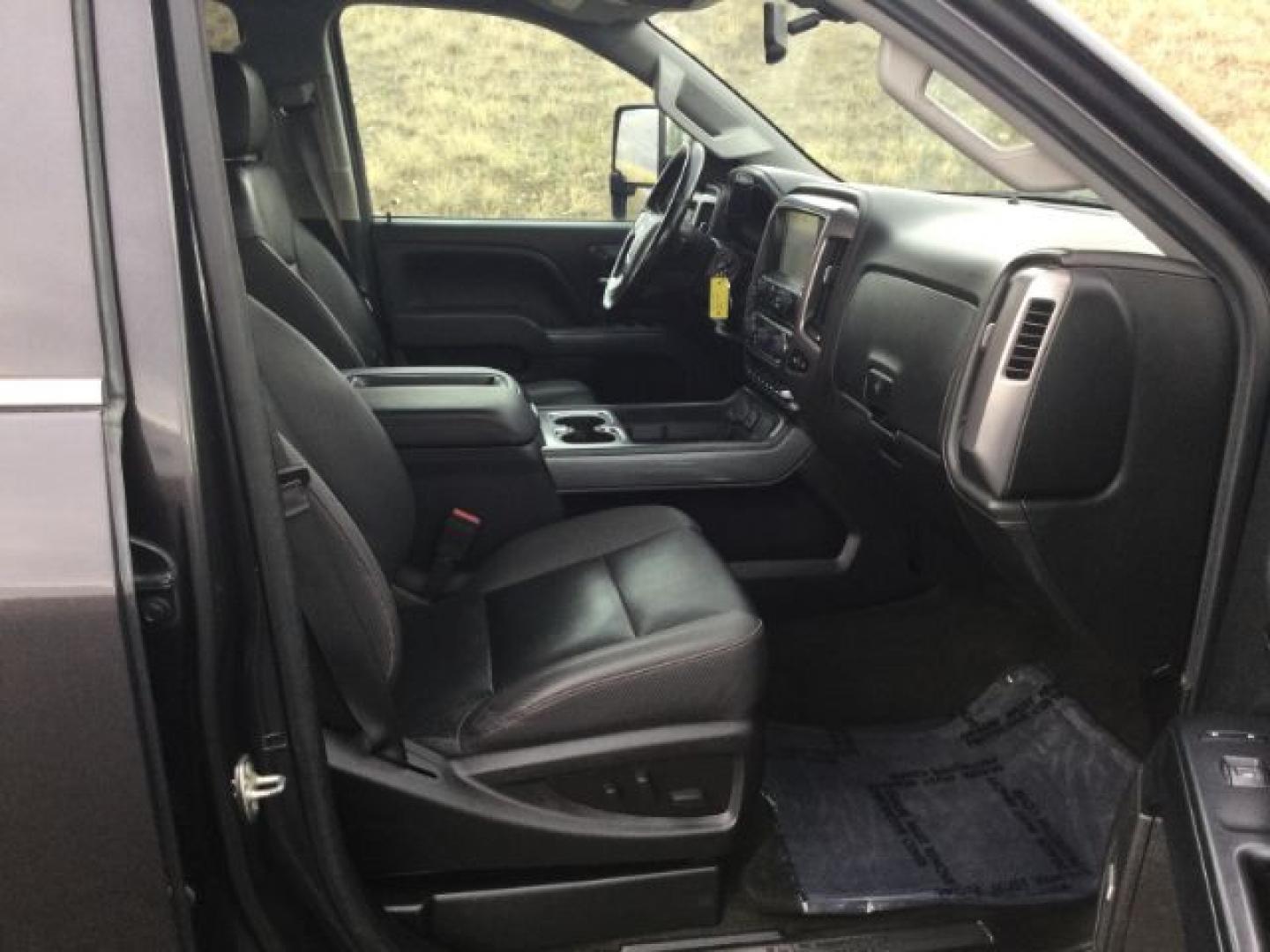 2015 Iridium Metallic /Dark Ash/Jet Black GMC 3500 Crew 4x4 SLT (1GT423C85FF) with an 6.6L V8 OHV 32V TURBO DIESEL engine, 6-Speed Automatic transmission, located at 1801 Main Street, Lewiston, 83501, (208) 743-9371, 46.417065, -117.004799- Photo#13