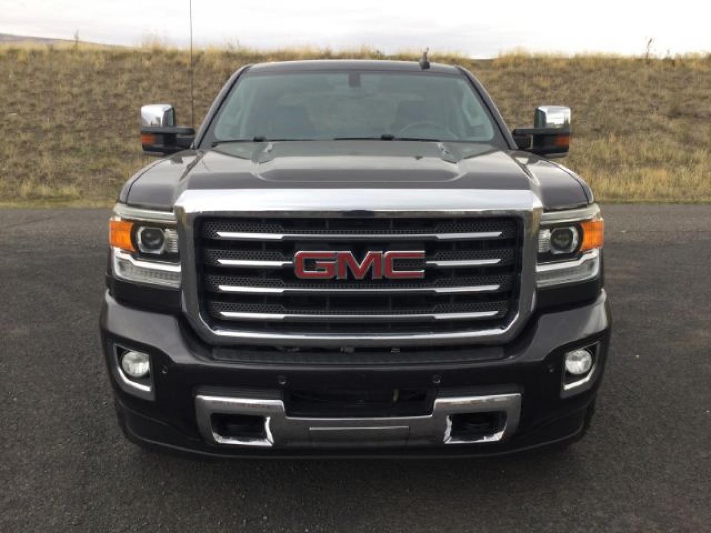 2015 Iridium Metallic /Dark Ash/Jet Black GMC 3500 Crew 4x4 SLT (1GT423C85FF) with an 6.6L V8 OHV 32V TURBO DIESEL engine, 6-Speed Automatic transmission, located at 1801 Main Street, Lewiston, 83501, (208) 743-9371, 46.417065, -117.004799- Photo#20